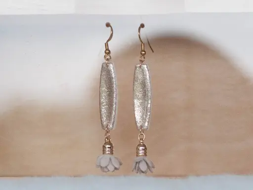 Boucles "Eclat" dorées pompons